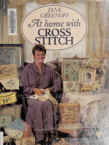 Cover image for At home with cross stitch