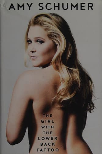 Cover image for The girl with the lower back tattoo