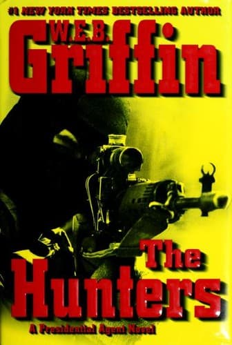 Cover image for The hunters