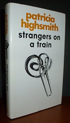 Cover image for Strangers on a train