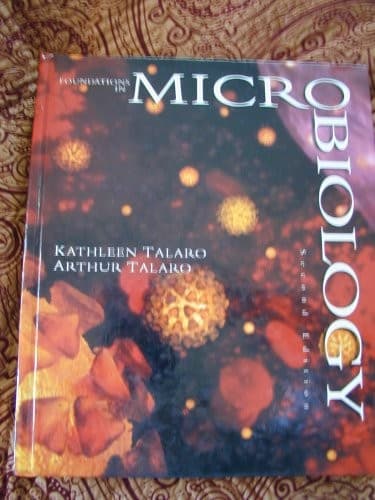Cover image for Foundations in microbiology