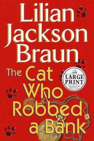 Cover image for The cat who robbed a bank