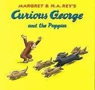 Cover image for Curious George and the Puppies