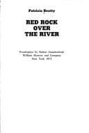 Cover image for Red rock over the river.