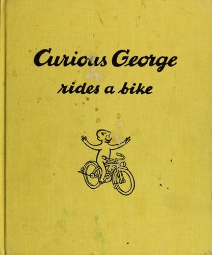 Cover image for Curious George Rides a Bike