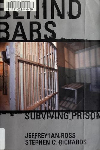Cover image for Behind bars