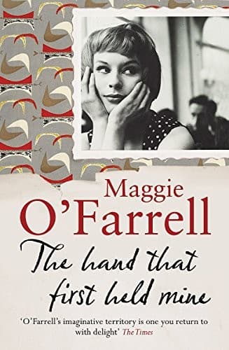 Cover image for The Hand That First Held Mine